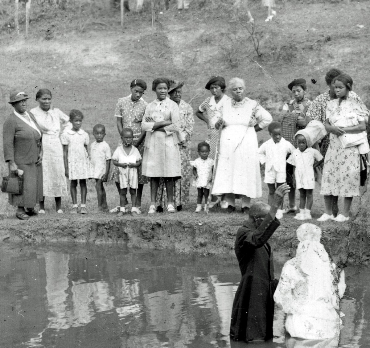 Rev Lester Suber at a baptism